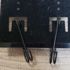 BLACK KT SAFTEY PIN EARRINGS